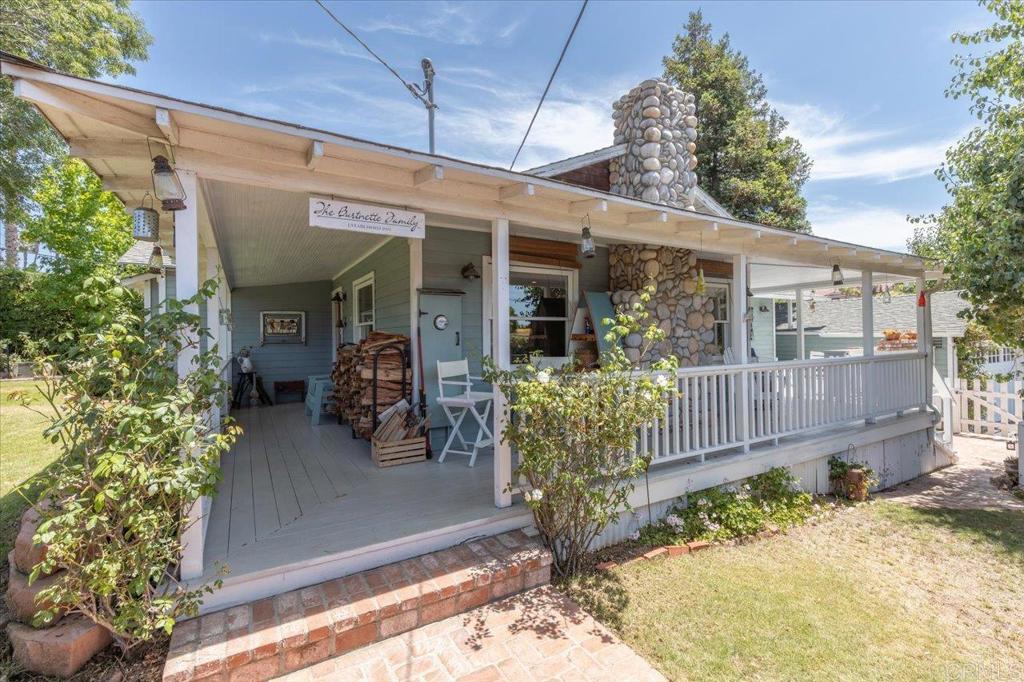 845 Crescent Drive Vista, CA 92084 - Photo 2 of 22 a view of a chair and tables in the patio