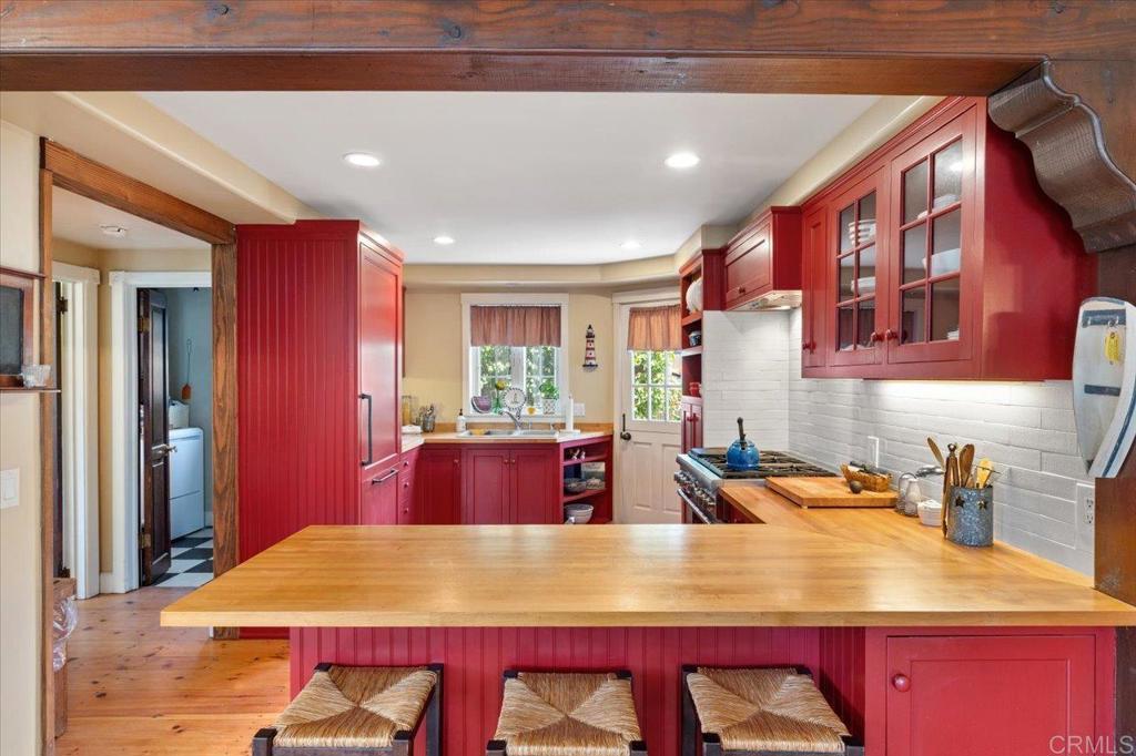 845 Crescent Drive Vista, CA 92084 - Photo 6 of 22 a dining room with a table and chairs