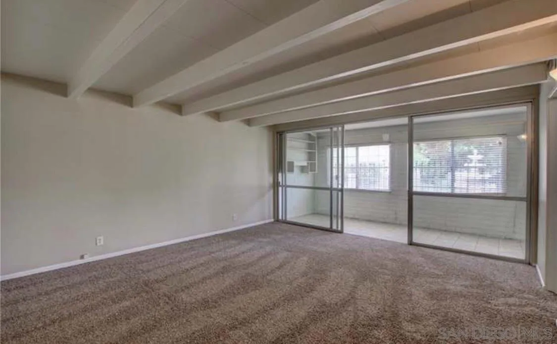 632 Gibbel Road Hemet, CA 92543 - Photo 6 of 11 a view of an empty room with glass door