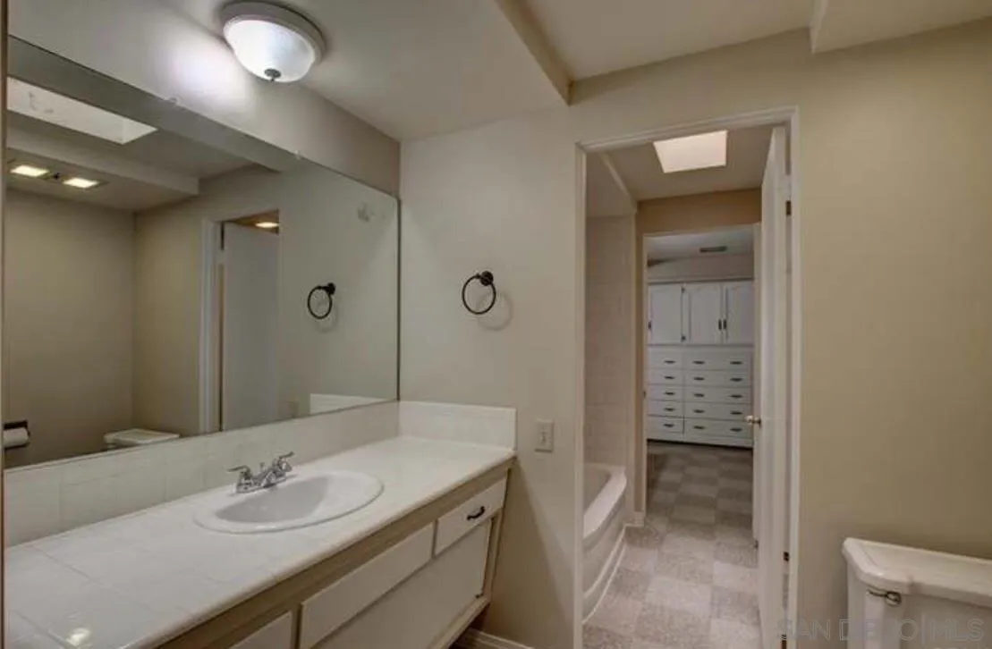 632 Gibbel Road Hemet, CA 92543 - Photo 7 of 11 a bathroom with a sink a toilet and shower