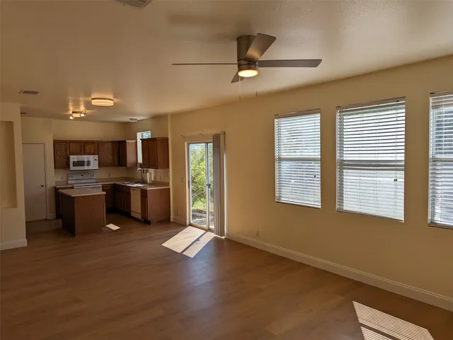 a view of kitchen and windows