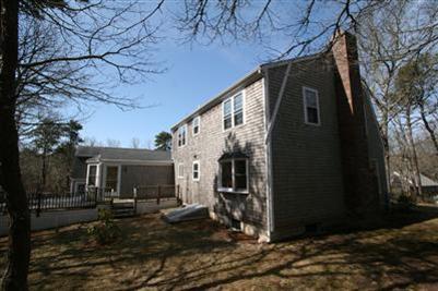 44 Joshua Jethro Road Harwich, MA 02645 - Photo 4 of 21 a view of house with backyard space