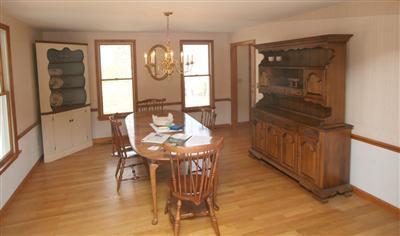 44 Joshua Jethro Road Harwich, MA 02645 - Photo 10 of 21 a view of a dining room with furniture window and wooden floor