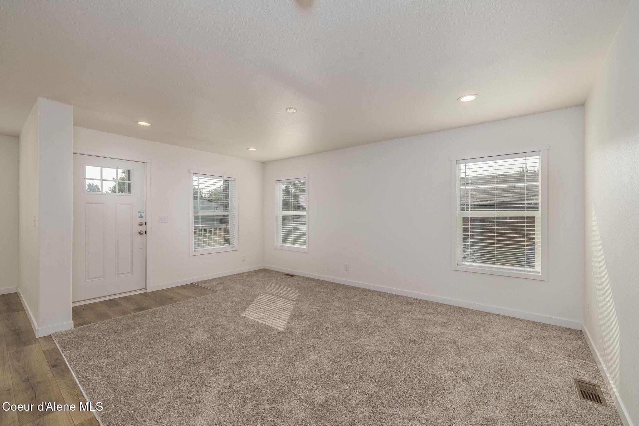 11474 North Alaska Loop Hayden, ID 83835 - Photo 8 of 23 LIGHT & AIRY LIVING ROOM