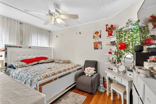 a living room with furniture and flowers