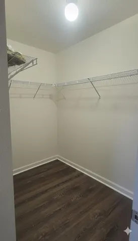 a view of a room with racks on the wall