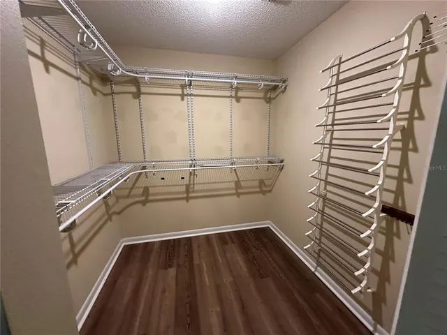 a view of a room with racks on the wall