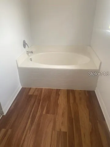 a bathroom with a bathtub