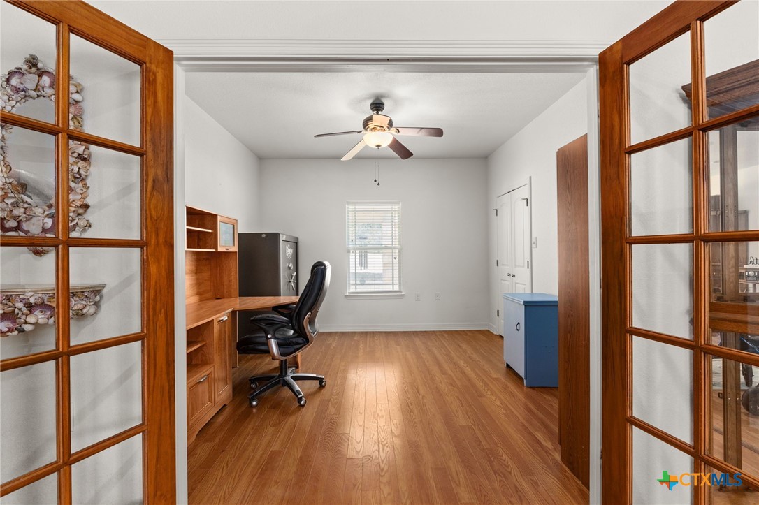13061 Oakalla Road Killeen, TX 76549 - Photo 22 of 33 a view of a workspace with furniture and a window