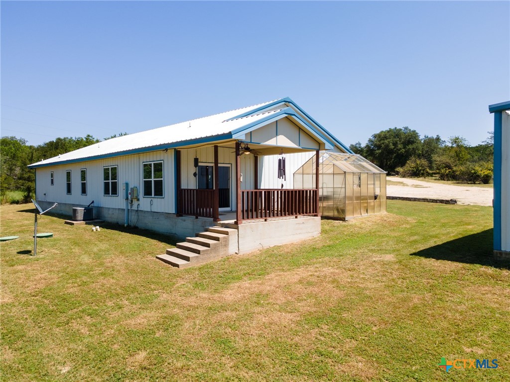 13061 Oakalla Road Killeen, TX 76549 - Photo 25 of 33 a view of a house with swimming pool next to a yard