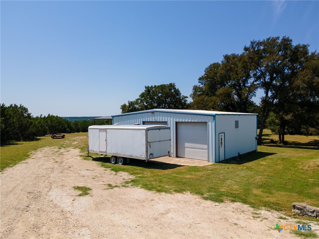 13061 Oakalla Road Killeen, TX 76549 - Photo 26 of 33 a view of a house with pool and a yard