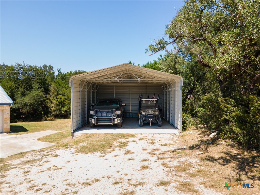 13061 Oakalla Road Killeen, TX 76549 - Photo 5 of 33 a view of a house with a yard covered in snow