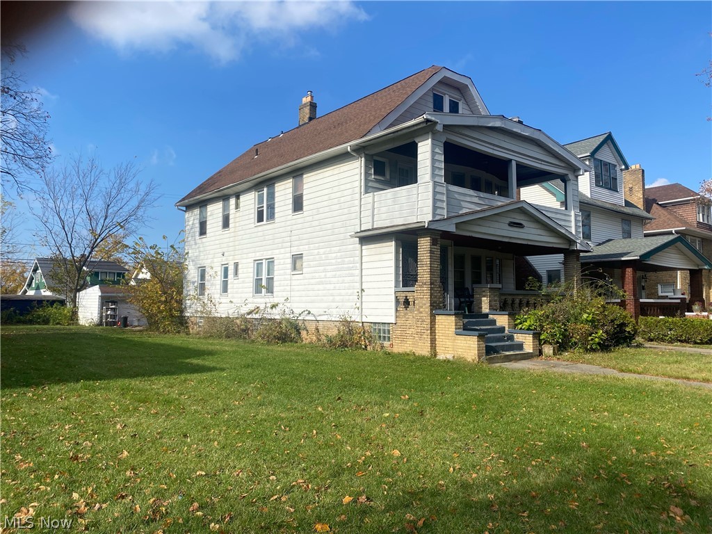 3634 Hildana Road Cleveland, OH 44120 - Photo 2 of 11 View of front of house featuring a front lawn