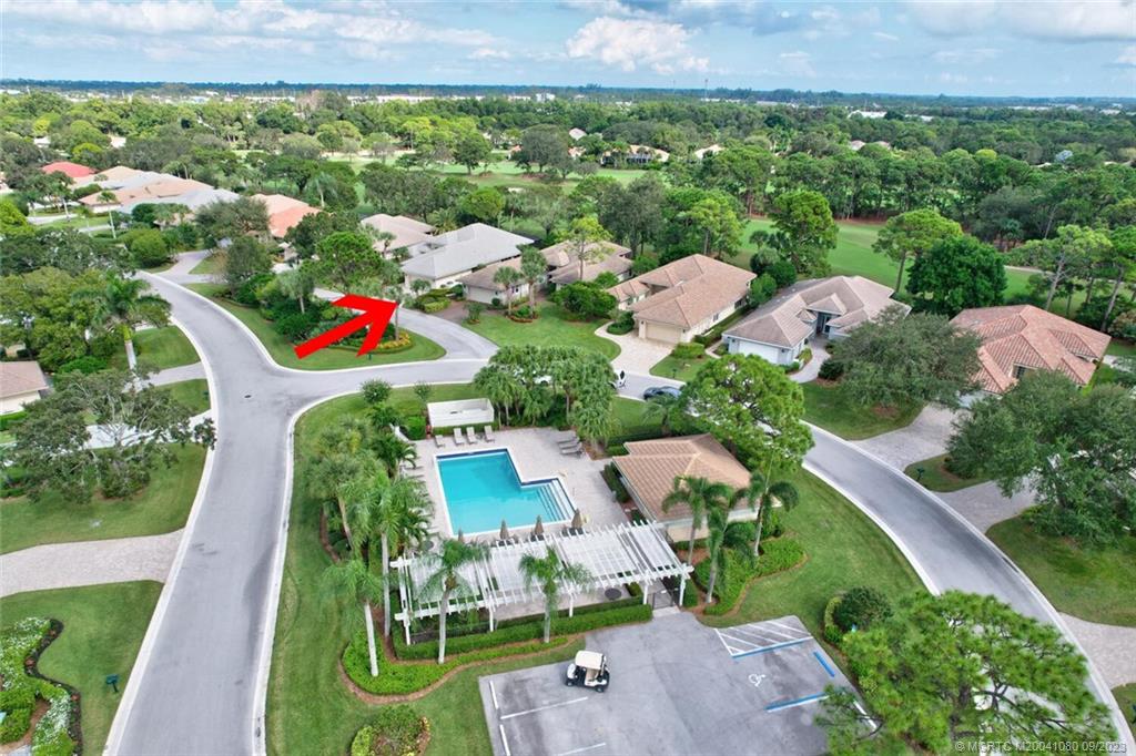 3531 Southeast Cambridge Drive Stuart, FL 34997 - Photo 2 of 44 an aerial view of multiple house