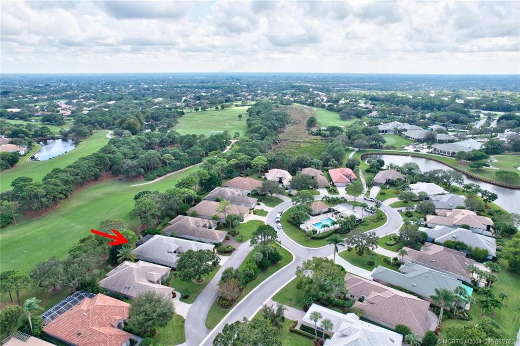 3531 Southeast Cambridge Drive Stuart, FL 34997 - Photo 3 of 44 an aerial view of a
