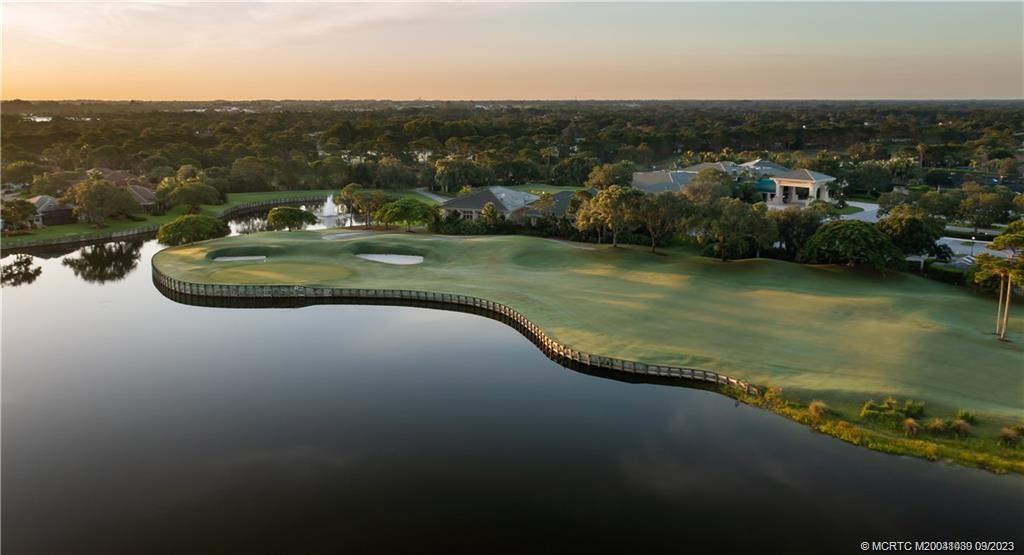 3531 Southeast Cambridge Drive Stuart, FL 34997 - Photo 43 of 44 an aerial view of a houses with outdoor space and ocean view