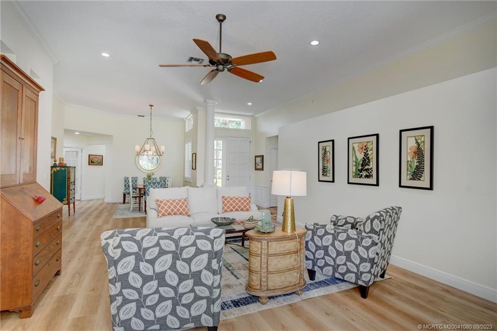3531 Southeast Cambridge Drive Stuart, FL 34997 - Photo 7 of 44 a living room with furniture