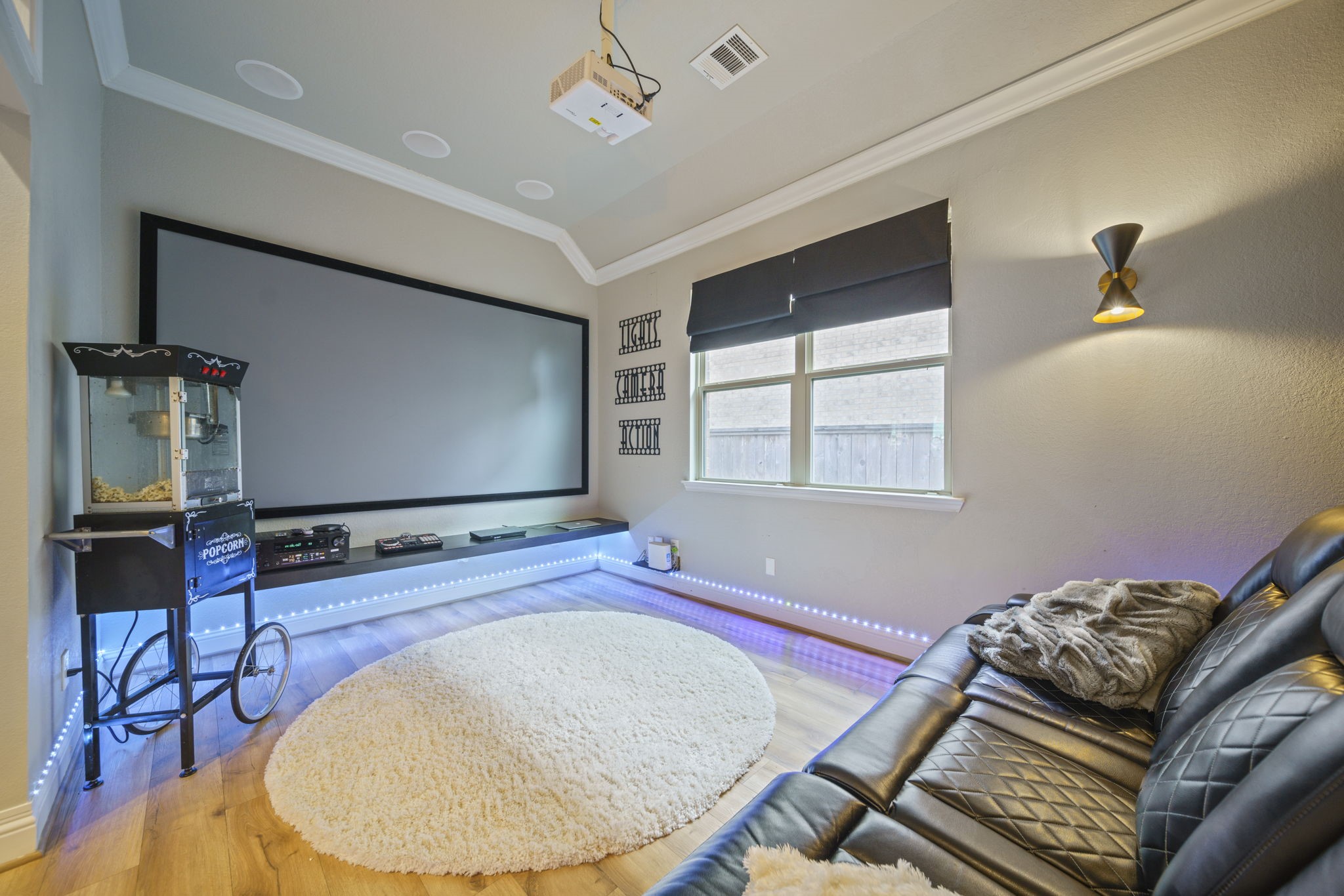 15 Inland Prairie Drive Tomball, TX 77375 - Photo 16 of 46 Another view of the media room/game room with lighting.