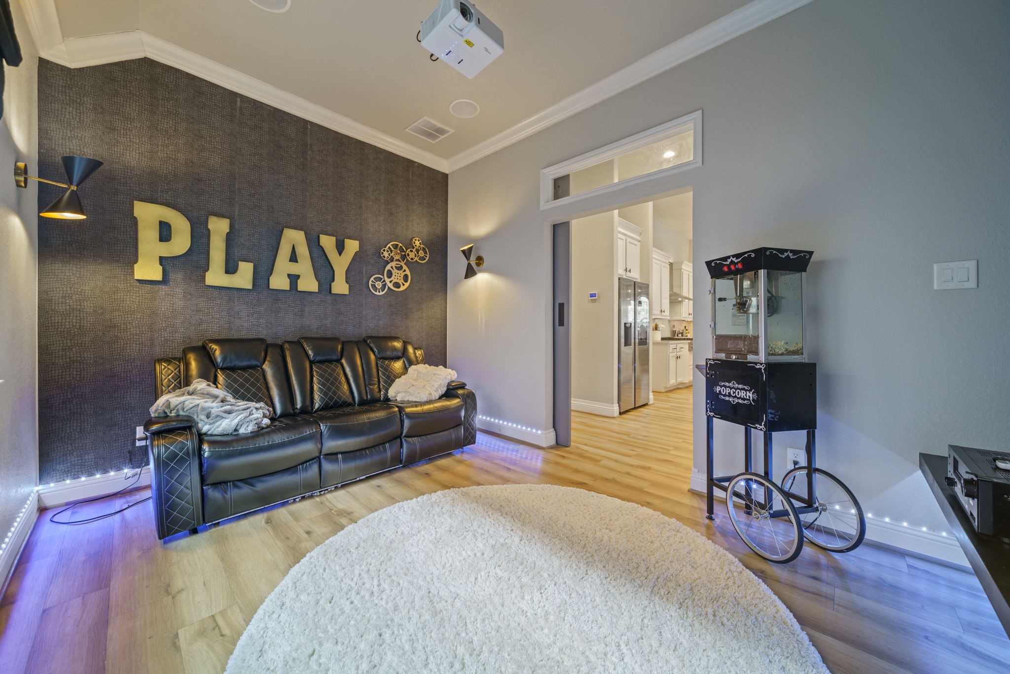 15 Inland Prairie Drive Tomball, TX 77375 - Photo 17 of 46 The media room/Game room view into the kitchen area.