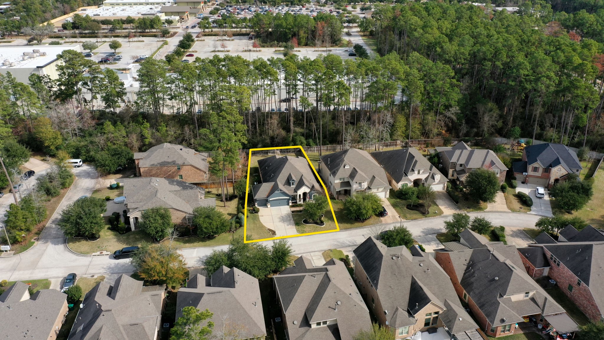 15 Inland Prairie Drive Tomball, TX 77375 - Photo 45 of 46 The home is highlighted in yellow with the green space behind it showing the walking distance to the neighborhood amenities.