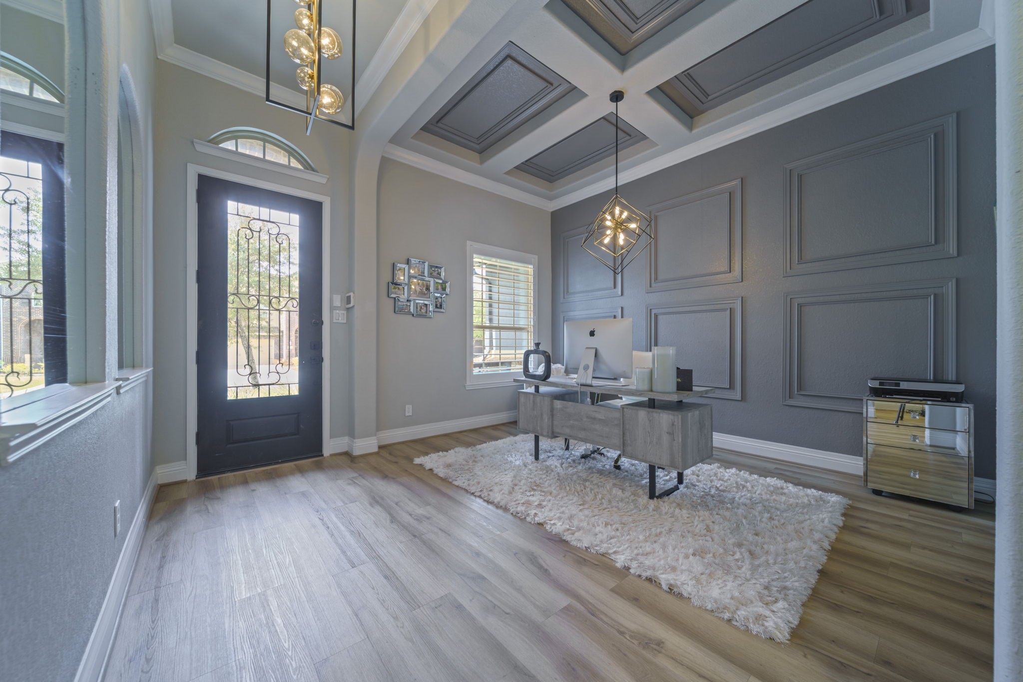15 Inland Prairie Drive Tomball, TX 77375 - Photo 5 of 46 This home office or dining room is right off the entry. The space is brightened by a large window and glass-panel door.