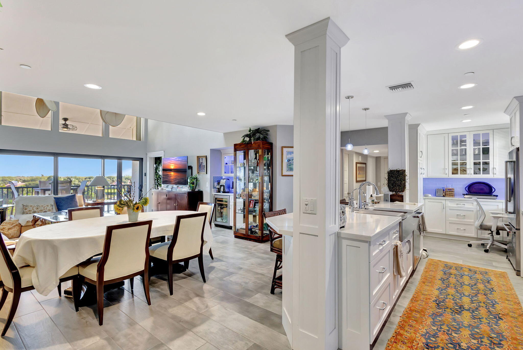 16910 Bay Street, Unit E503 Jupiter, FL 33477 - Photo 27 of 33 a view of a dining room with furniture