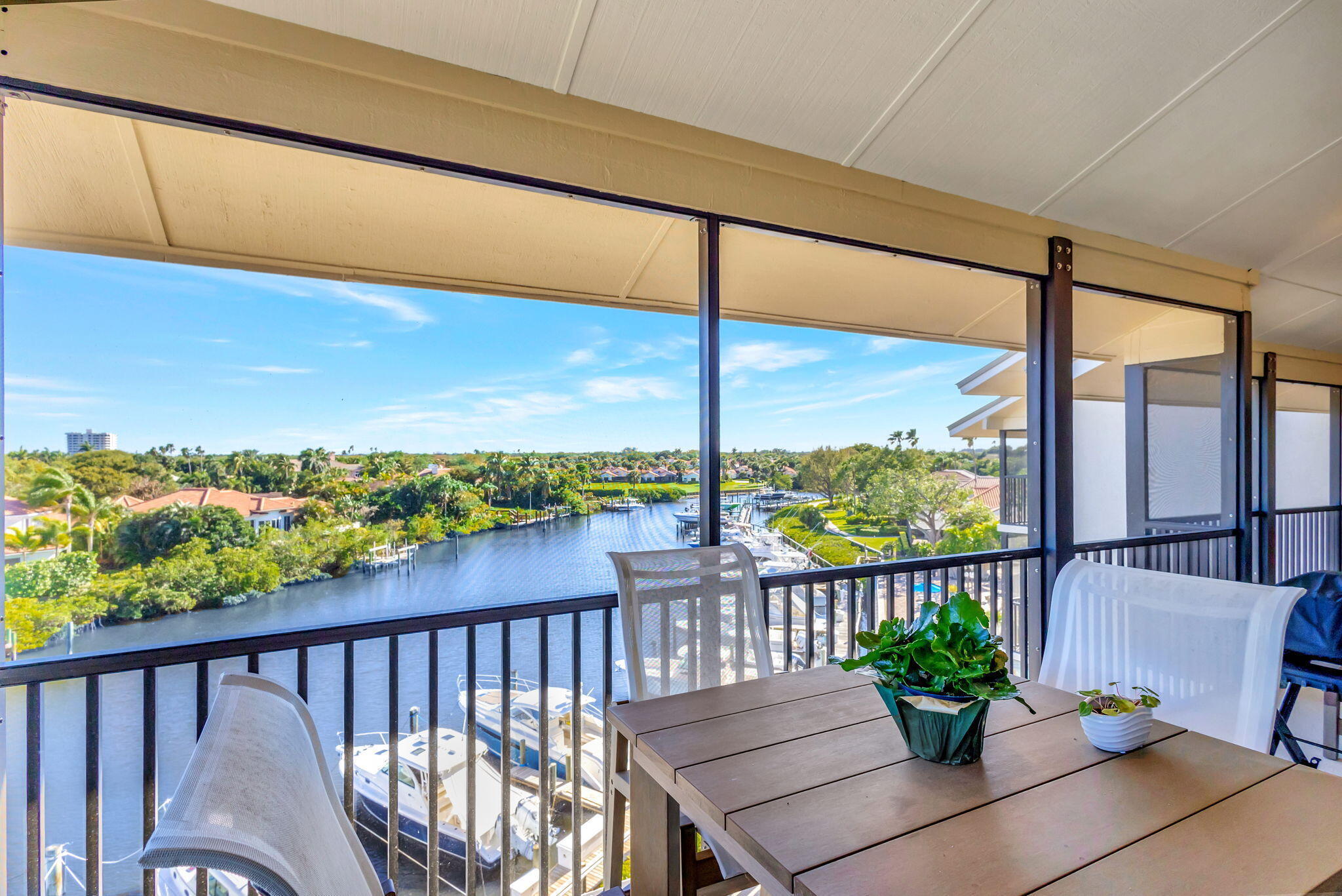 16910 Bay Street, Unit E503 Jupiter, FL 33477 - Photo 31 of 33 a view of a balcony with furniture