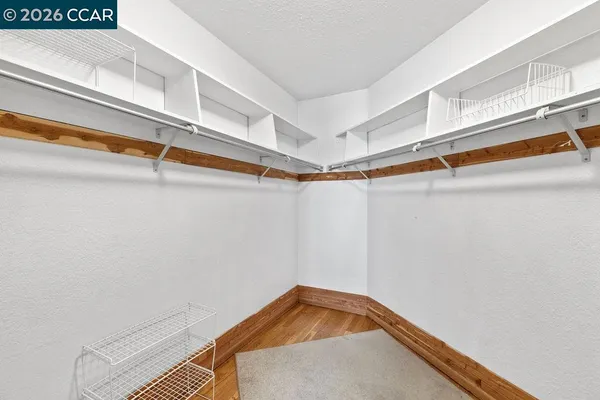 a view of a room with racks on the wall