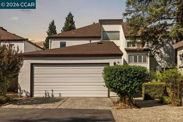 a front view of a building with a street