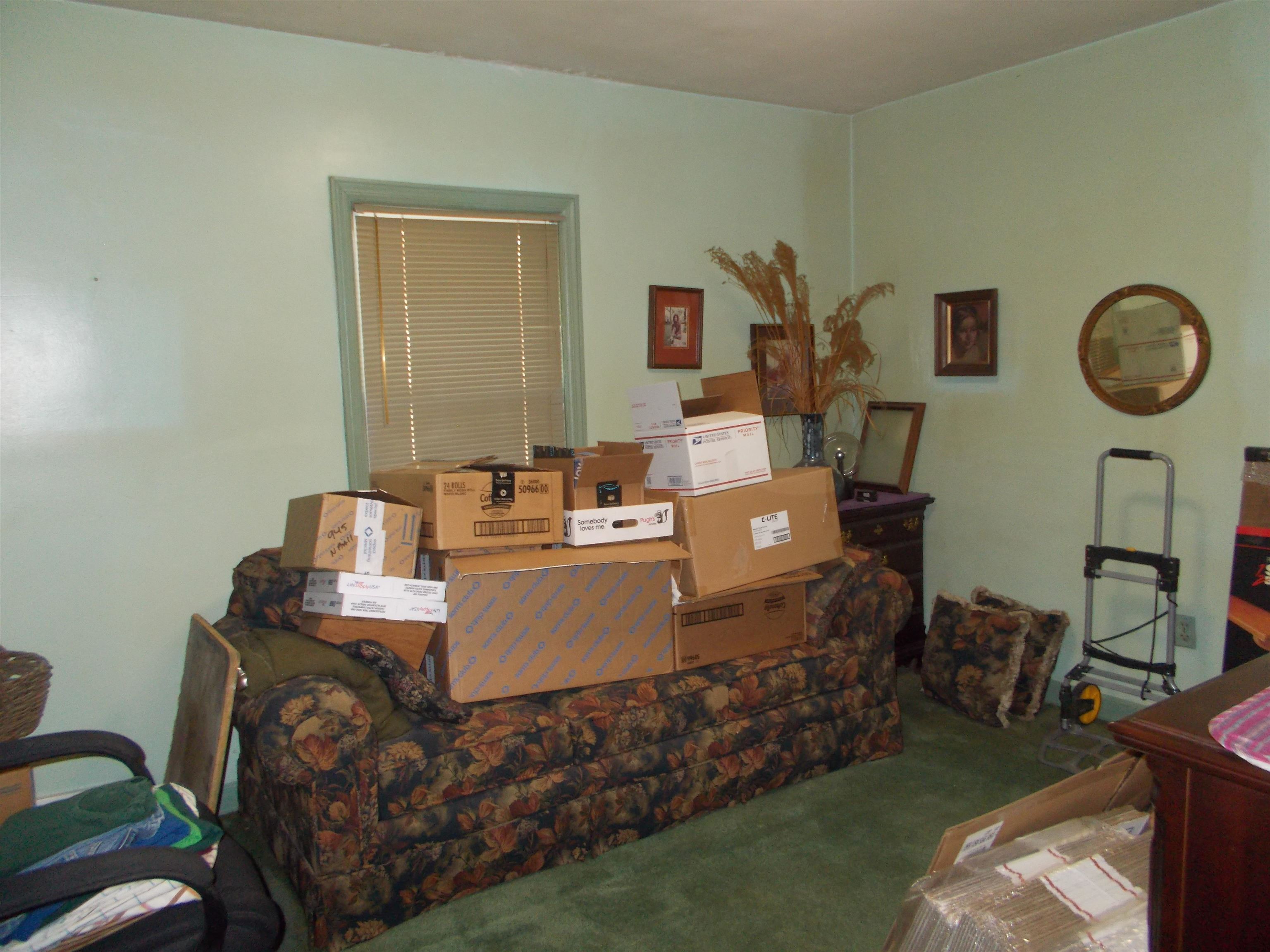 954 North Ball Road Memphis, TN 38106 - Photo 13 of 25 a living room with furniture and a window