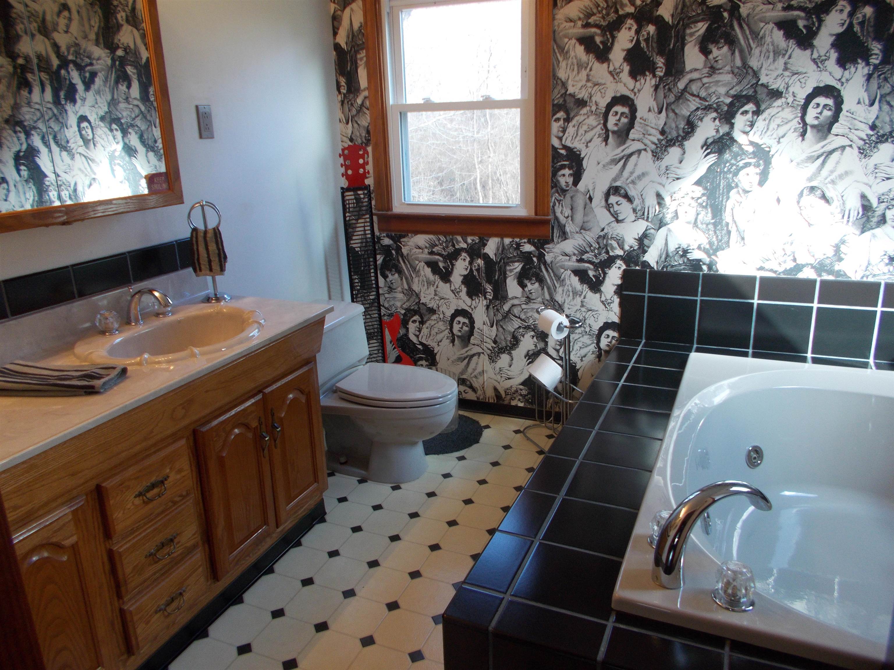 954 North Ball Road Memphis, TN 38106 - Photo 20 of 25 a bathroom with a sink toilet and shower