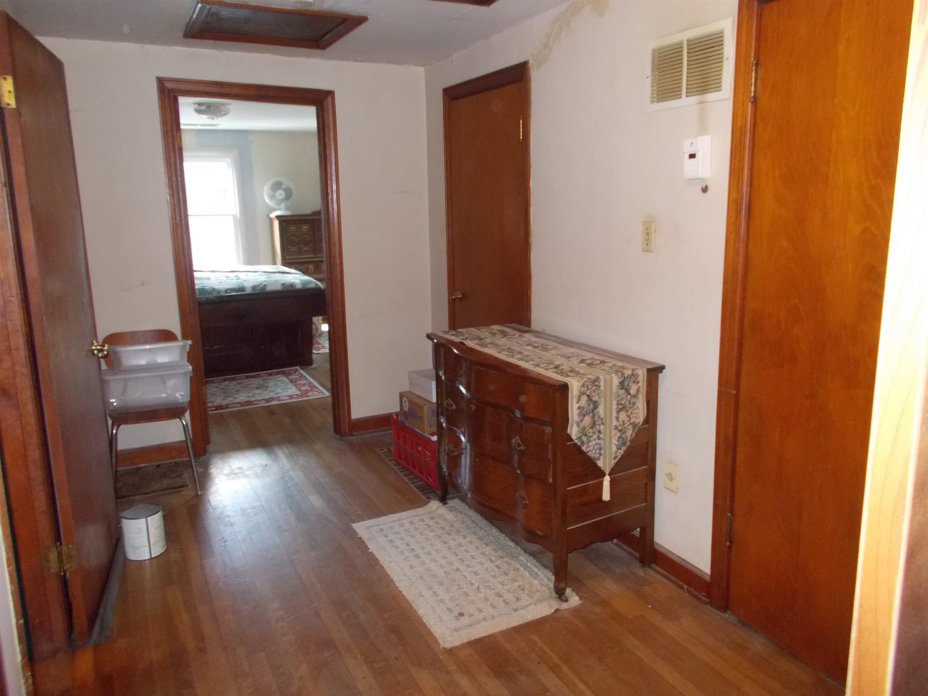 954 North Ball Road Memphis, TN 38106 - Photo 21 of 25 a living room with furniture and a wooden floor