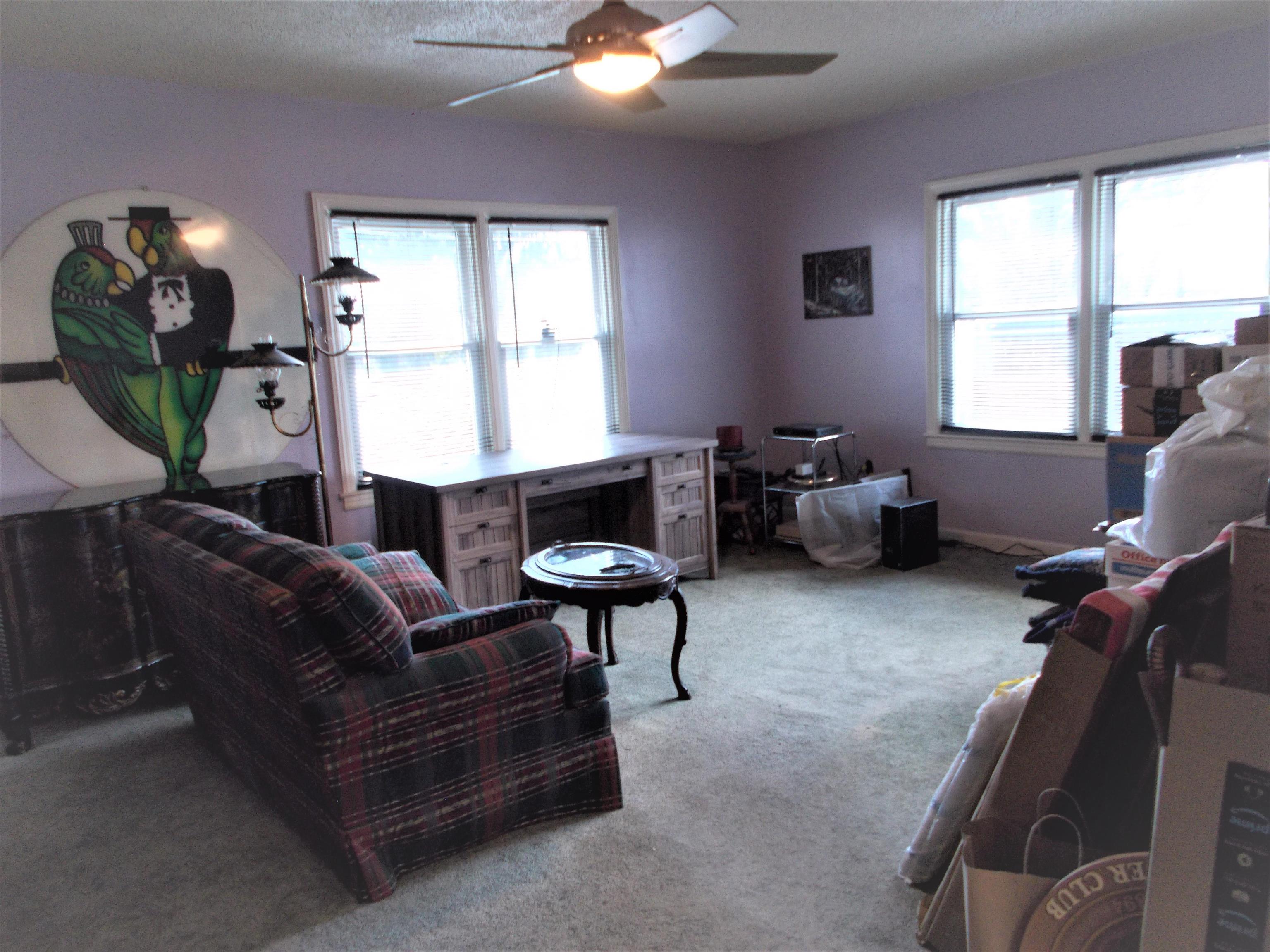 954 North Ball Road Memphis, TN 38106 - Photo 4 of 25 a living room with furniture and a window