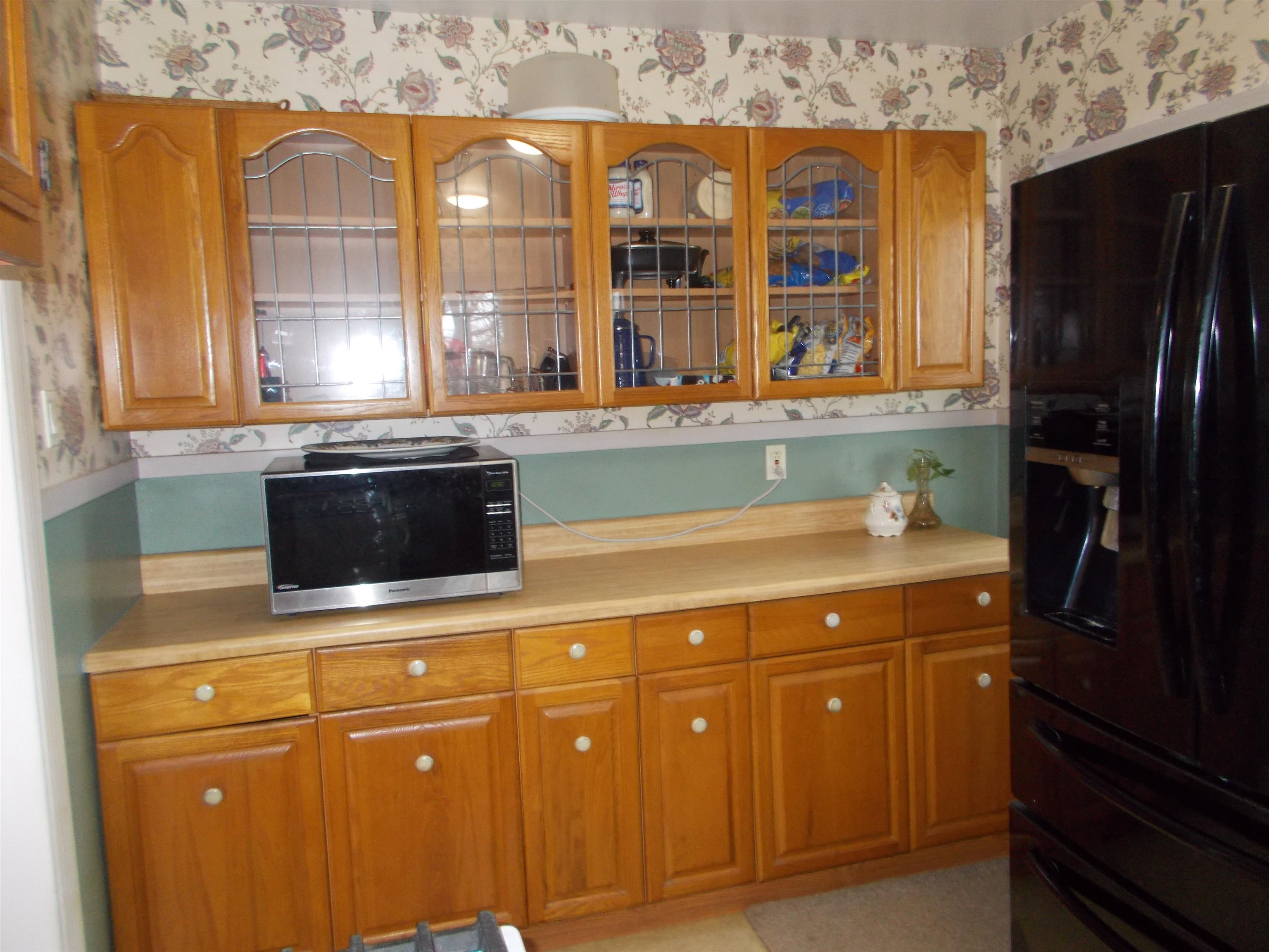 954 North Ball Road Memphis, TN 38106 - Photo 8 of 25 a kitchen with stainless steel appliances granite countertop a refrigerator and a stove