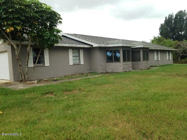 175 East Crisafulli Road Merritt Island, FL 32953 - Photo 1 of 18 FRONT