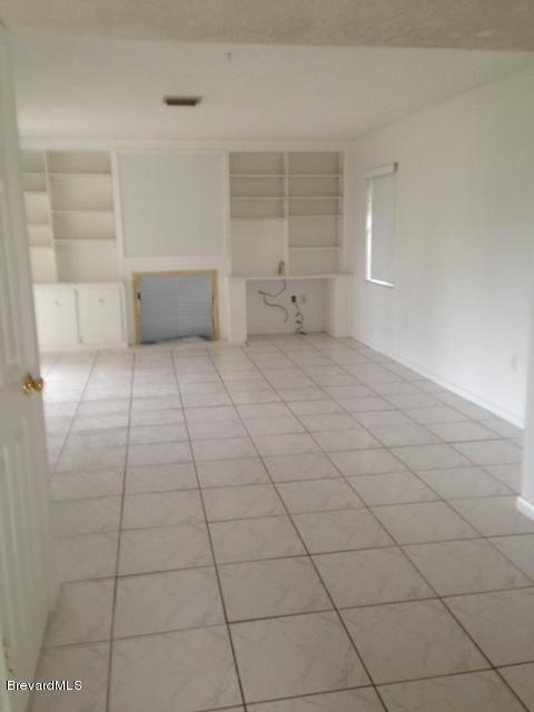 175 East Crisafulli Road Merritt Island, FL 32953 - Photo 2 of 18 FAMILY ROOM