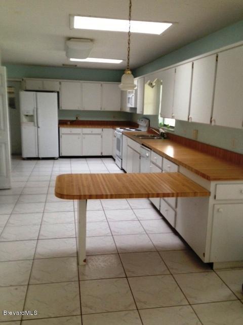 175 East Crisafulli Road Merritt Island, FL 32953 - Photo 4 of 18 KITCHEN
