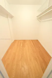 a view of a hallway with elevator