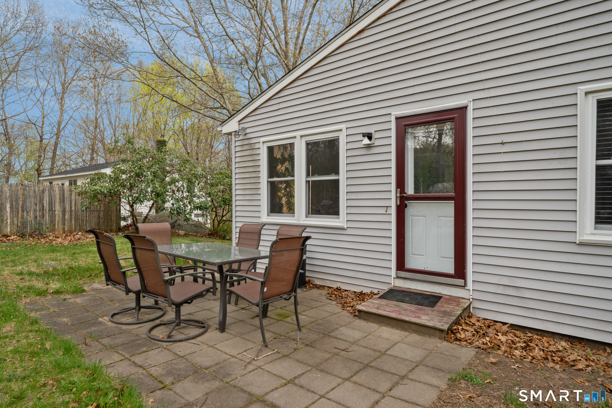 12 Lake Street Ledyard, CT 06339 - Photo 17 of 19 a view of a house with backyard and sitting area