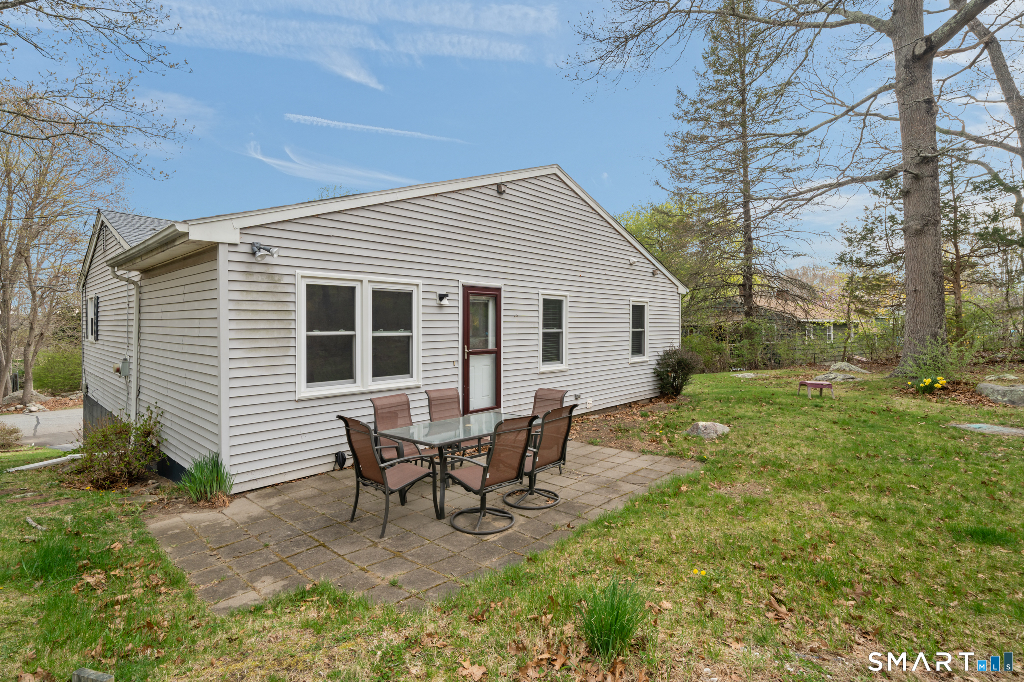 12 Lake Street Ledyard, CT 06339 - Photo 18 of 19 a view of a house with backyard and sitting area