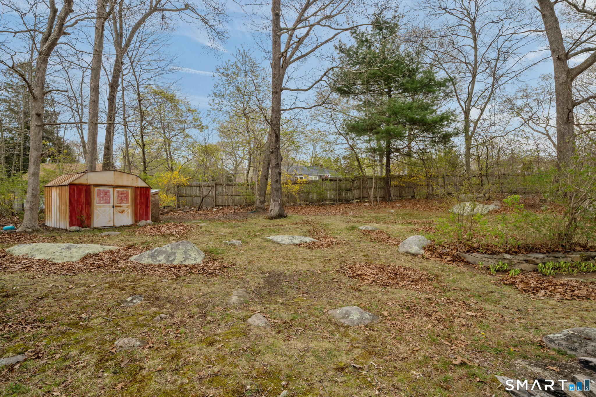 12 Lake Street Ledyard, CT 06339 - Photo 19 of 19 a backyard of a house with lots of green space