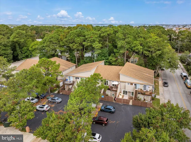 an aerial view of a house with a garden