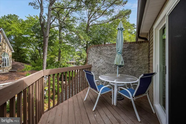 an aerial view of a house with swimming pool garden and patio