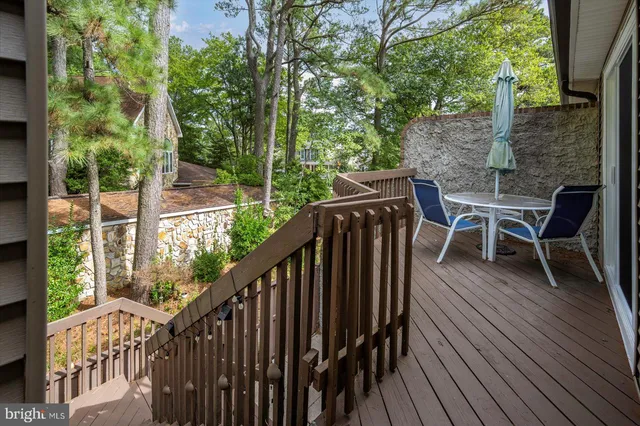an aerial view of a house with a swimming pool