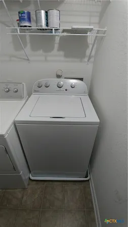 a view of a livingroom with wooden floor