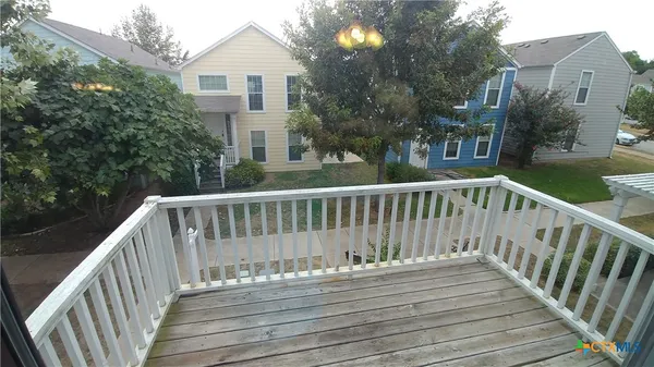 a view of parking garage with furniture