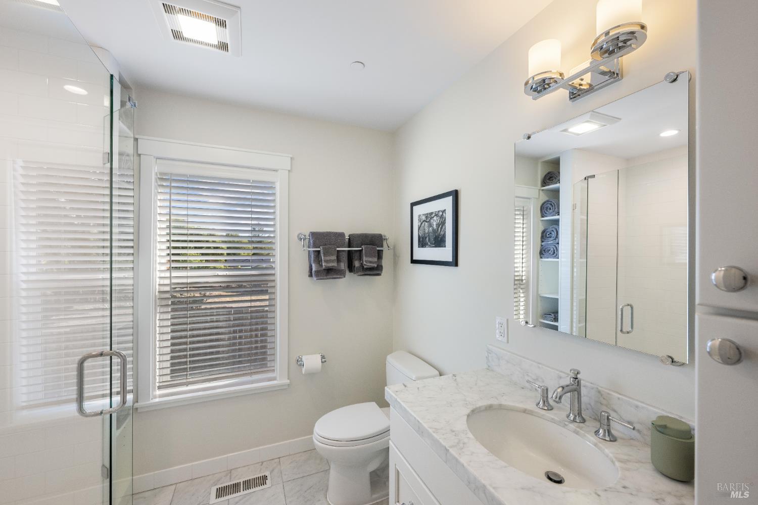 4920 Warm Springs Road Glen Ellen, CA 95442 - Photo 18 of 50 Guest bath with walk-in shower, linen storage.