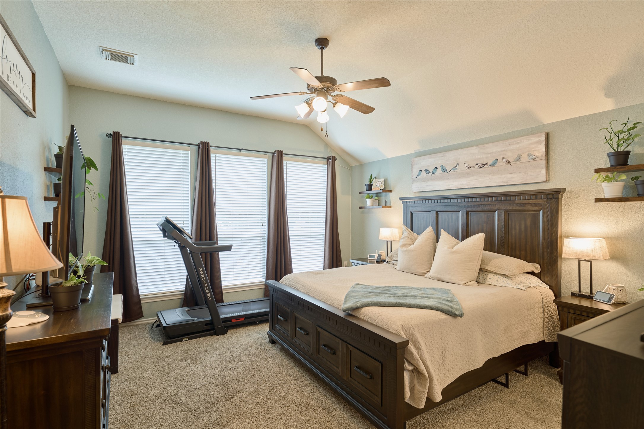 28322 Madelin Manor Lane Spring, TX 77386 - Photo 15 of 46 a bedroom with a bed a desk and chair