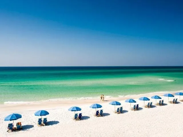a view of a cafe with sitting area
