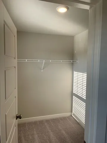 a view of a room with racks on the wall